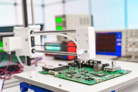 Debugging electronics device. PCB witch microcontroller in electronics Stock Photos