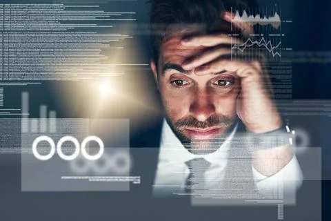 Debugging is no easy task. Cropped shot of a young businessman looking stressed 写真素材