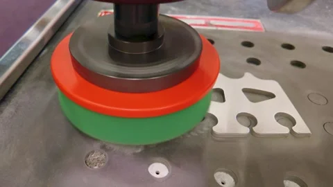 Deburring and linishing machine polishing sheet metal part with rotary abrasive Stock Footage 336418276