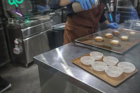 Dec 8 2024 Chef Using Culinary Torch to Caramelize Pastry, Jiyugaoka Stock Photos