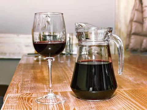 Decanter and a glass of wine Stock Photos