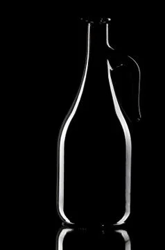 Decanter on the black background Stock Photos