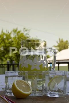 Decanter lemonade glasses Stock Photos