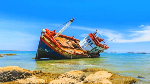 Decay rusty old ship, abandoned ship in blue sky Stock Footage 52349898
