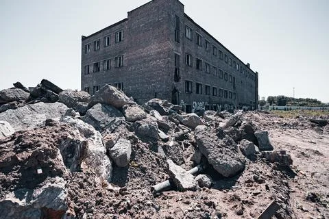 Decayed Brick Facade of an Abandoned Building. Stock Photos