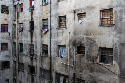 Decayed building used as residence. Stock Photos
