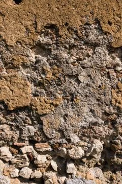 Decayed concrete and brick wall texture. Stock Photos