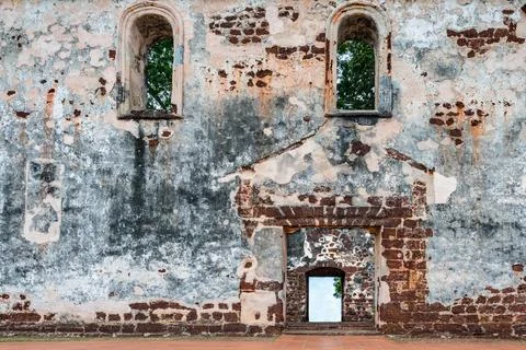 Decayed eroded stained brick wall, with beautiful patterns and textures Photos
