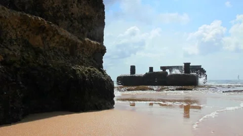 Decaying dock on beach Stock Footage 8666105