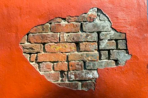 Decaying old red brick wall Stock Photos