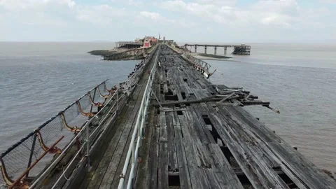 Decaying run down pier. Drone view of the rotting structure. Stock Footage 224280091