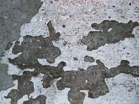 Decaying surface of an old concrete wall. Dents and crumbling surfaces. The Stock Illustration