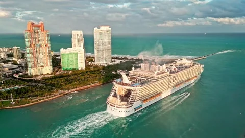 December 13, 2025 - Miami Beach, Florida: Aerial view Cruise ship Allure of the Stock Footage 309829648
