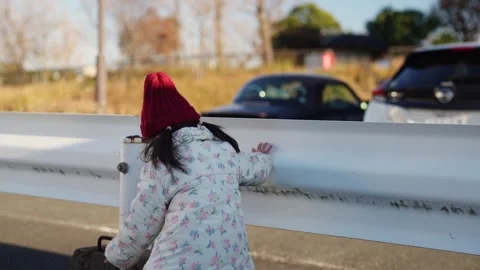 In December 2024, a 3-year-old Japanese girl spends a winter evening in a Stock Footage 297027185