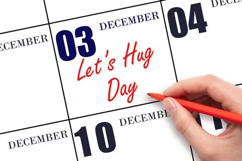 December 3rd. Hand writing text Let's Hug Day on calendar date. Save the date Stock Photos