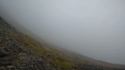 Decent off Mountain peak Stock Footage 236324704