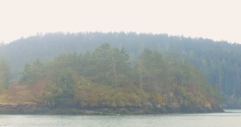 Deception pass from Puget Sound on a cloudy summer morning Stock-Footage 94234947