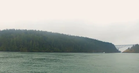 Deception pass from Puget Sound on a cloudy summer morning Stock-Footage 94235286