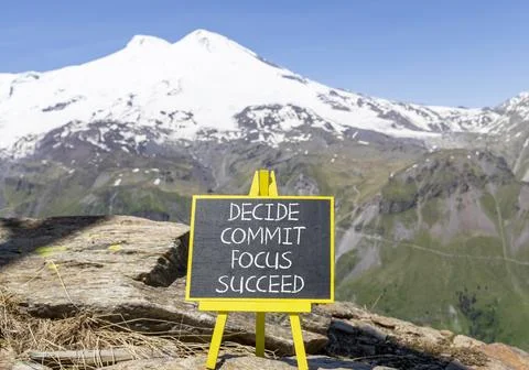 Decide commit focus succeed symbol. Concept word Decide Commit Focus Succee.. Stock Photos