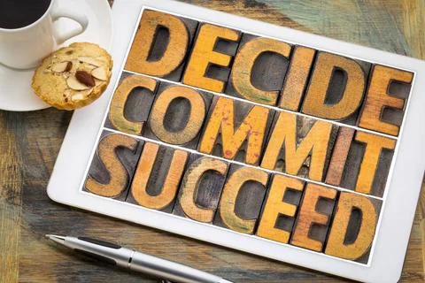 Decide, commit, succeed word abstract on tablet Decide, commit, succeed wo... Stock Photos