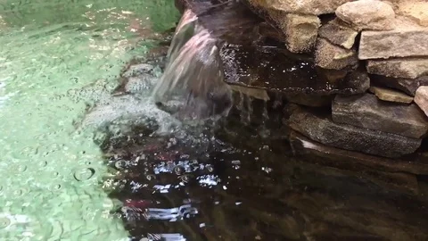 Decirative pool waterfall Stock Footage 81918995