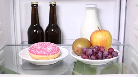 Decision for fruit instead of candy Stock Footage 135381403