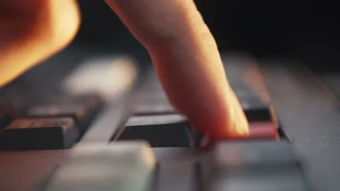 Decision-Making: Close-up of a Finger Pressing a Red Keyboard Button Stock Footage 314172271