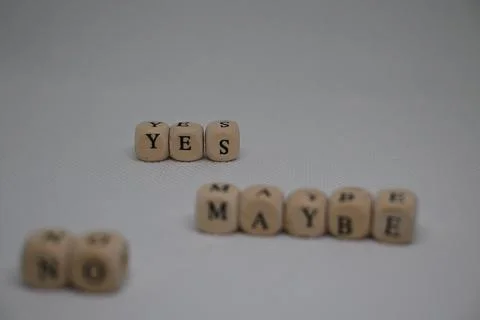 Decision Making Cubes Spelling Yes No and Maybe Words Stock Photos