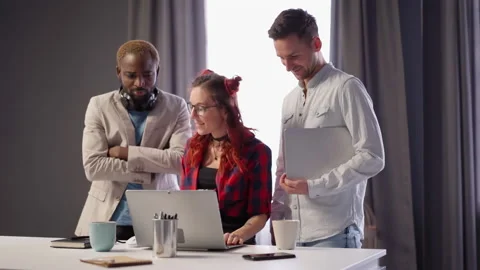 Decision-making. A young team is developing a project. Young creative business Stock Footage 160556932