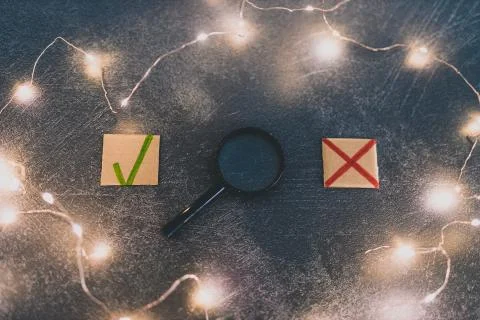 Decision taking concept green tick and red cross icon symbols made of cardboa Stock Photos