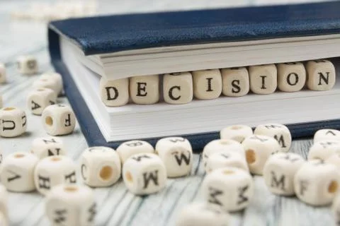 Decision word formed by wood alphabet blocks. Wooden ABC Photos