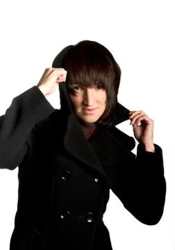 A decisive girl posing on a white background Stock Photos