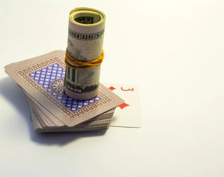 A deck of cards with dollars Stock Photos