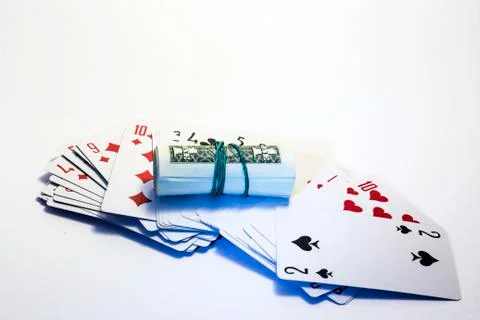 A deck of cards with dollars Stock Photos