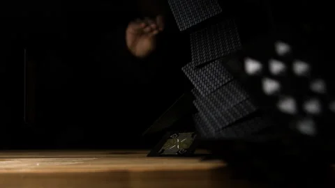 A Deck of Cards Fall on a Table and Cards Fly Everywhere Stock Footage 270400660