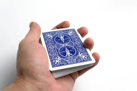 A deck of cards in hand on a white background isolate Stock Photos
