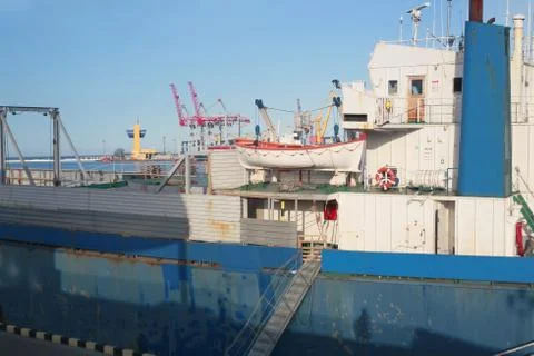 The deck of a cargo ship in seaport Stock Photos