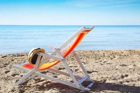 Deck chair on beach Foto stock