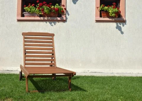 Deck Chair on Lawn Stock Photos