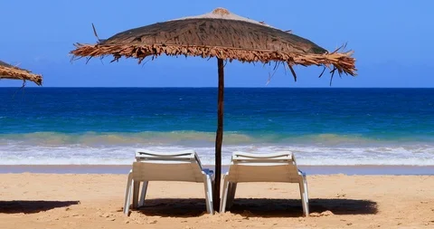 Deck chair on a paradise beach Stock Footage 100786727