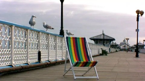 Deck chair on pier Stock Footage 139434