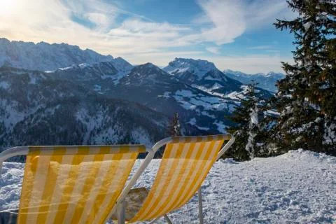 Deck chairs in austria in winter Stock Photos