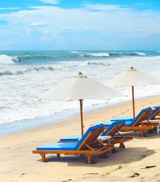 Deck chairs at Bali beach Stock-Fotos