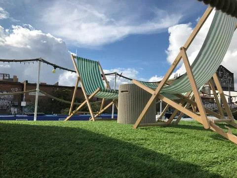 Deck chairs on a barge Stock Photos