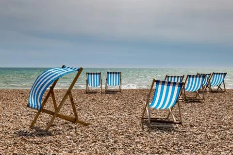 Deck Chairs on a Beach Foto stock