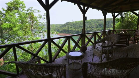 Deck With Chairs Overlooking Jungle and Paraná River With Paraguay in Stock Footage 318203090