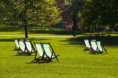 Deck chairs in a park Stock-Fotos