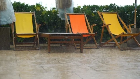 Deck Chairs in the Rain Time on Resort Stock Footage 120901302