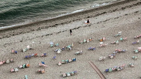 Deck chairs on the shore in Beer, Devon Stock Footage 874998