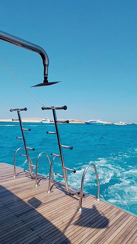 Deck shower over scuba diving racks on yacht stern in Red Sea Vídeos de archivo 347581989